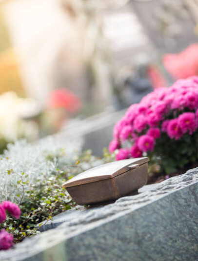 Iron holy water bowl on a cemetery